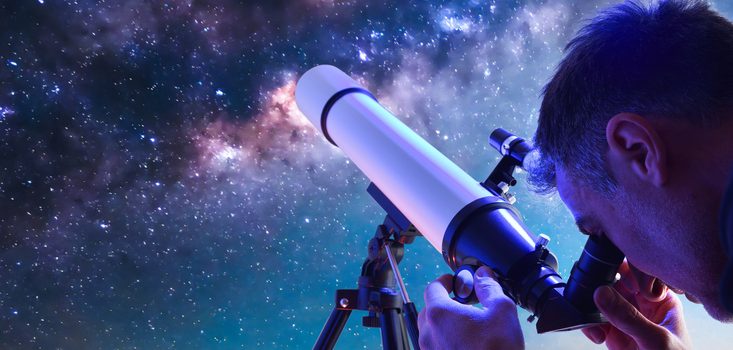 Episode 8 Facts Matter Man looking through telescope at a starry sky